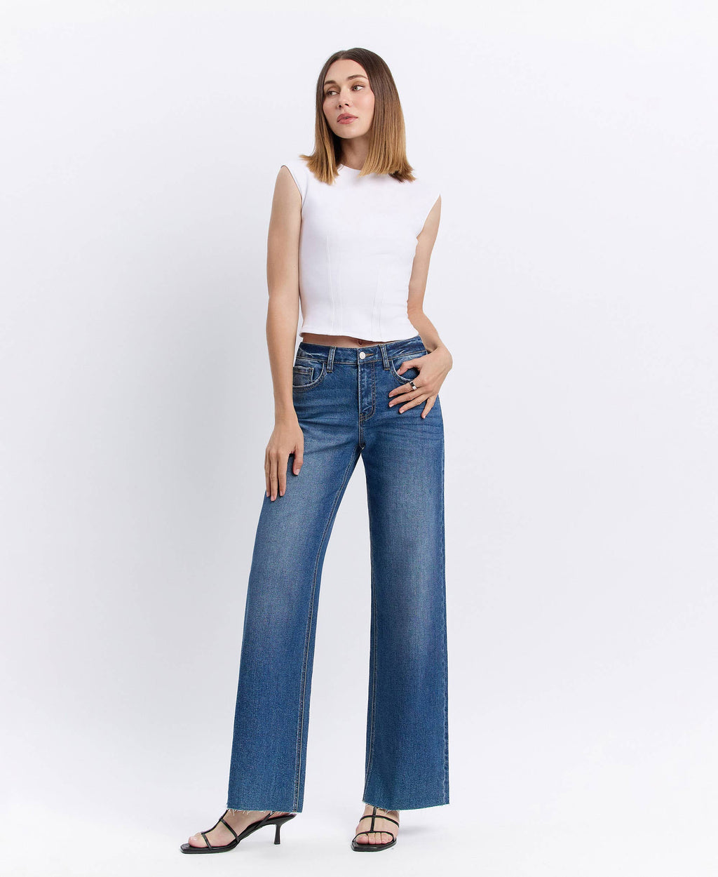 High Rise Clean Cut Raw Hem Jeans