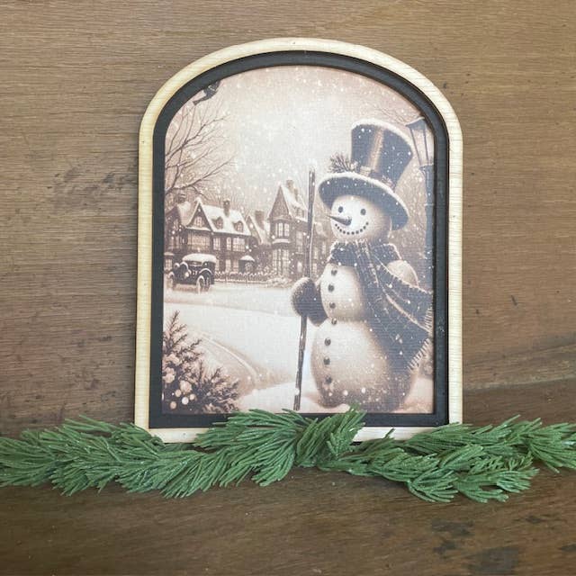 Snowman in Village Arch