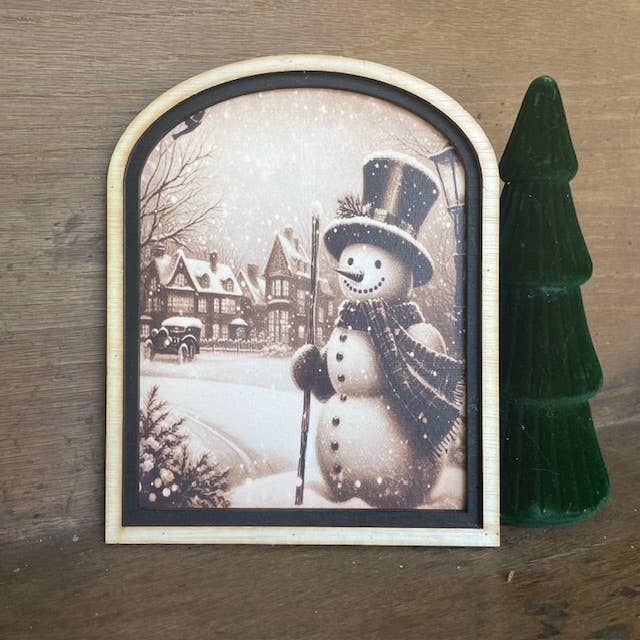 Snowman in Village Arch